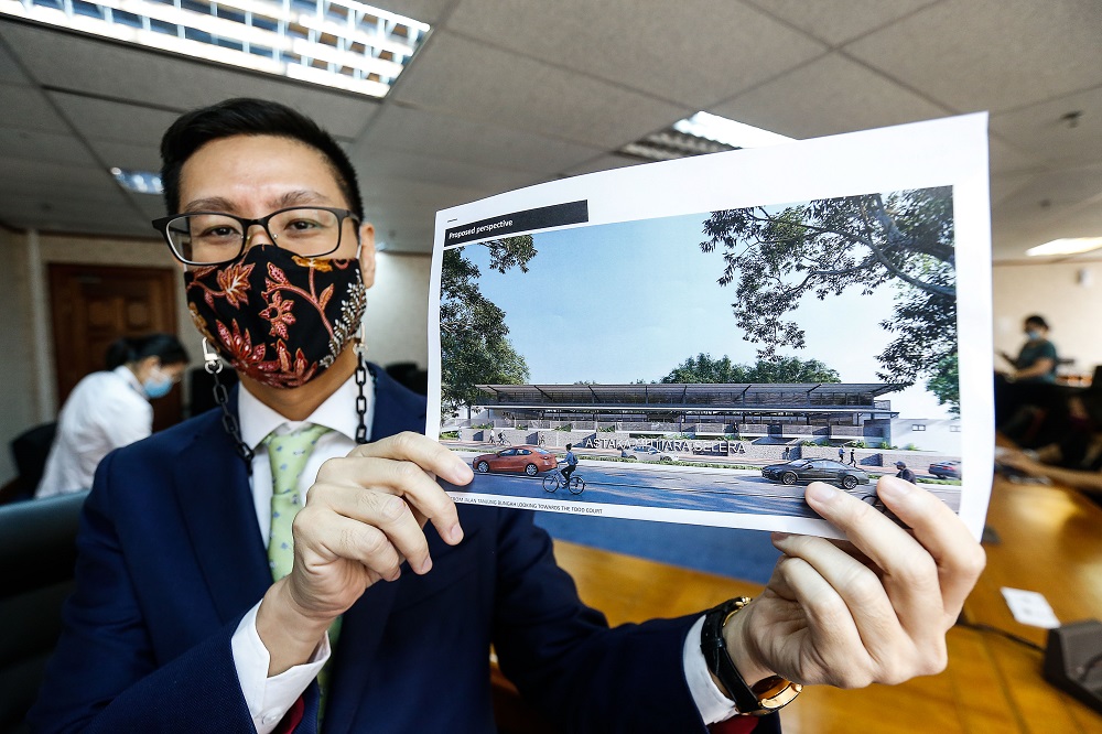 State Exco for Infrastructure and Transportation Zairil Khir Johari shows an artistu00e2u20acu2122s impression of the new foodcourt to be built in Tanjung Bungah April 27, 2021. u00e2u20acu2022 Picture by Sayuti Zainudin