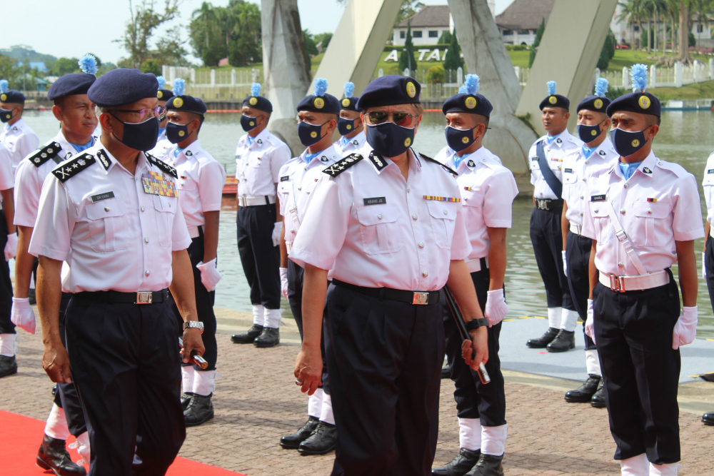 Chief Minister Datuk Patinggi Abang Johari Openg inspecting a guard of honour mounted by the Sarawak Coastguard personnel at the launch of the coastguard, April 7, 2021. u00e2u20acu201d Picture by Sarawak Public Communication Unit (UKAS)