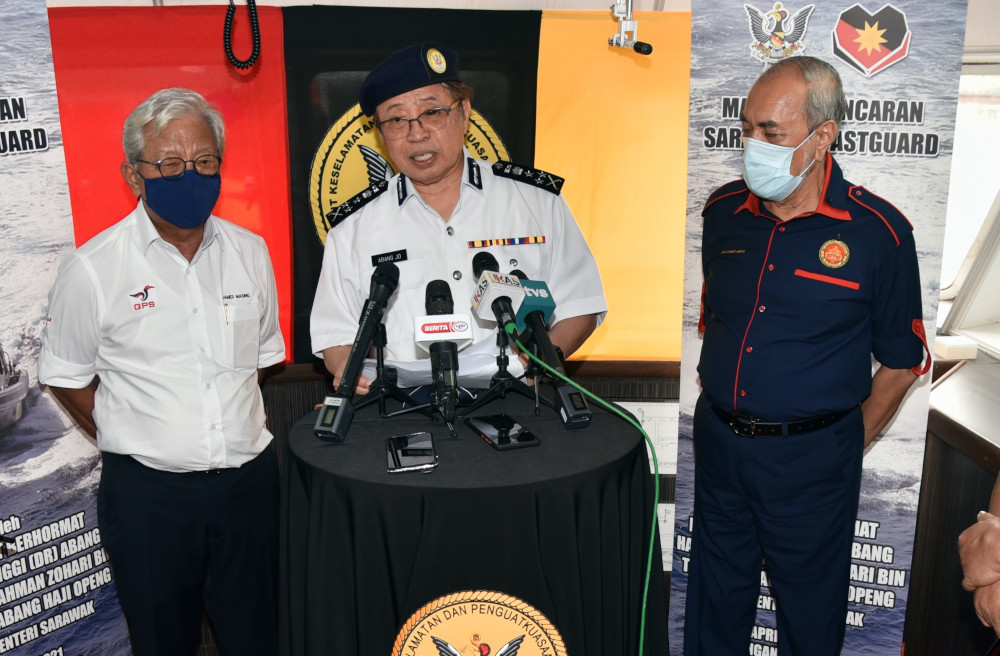 Chief Minister Datuk Patinggi Abang Johari Openg (centre) speaking to reporters, says the Covid-19 situation is under control, April 7, 2021. u00e2u20acu201d Picture by Sarawak Public Communication Unit (Ukas).