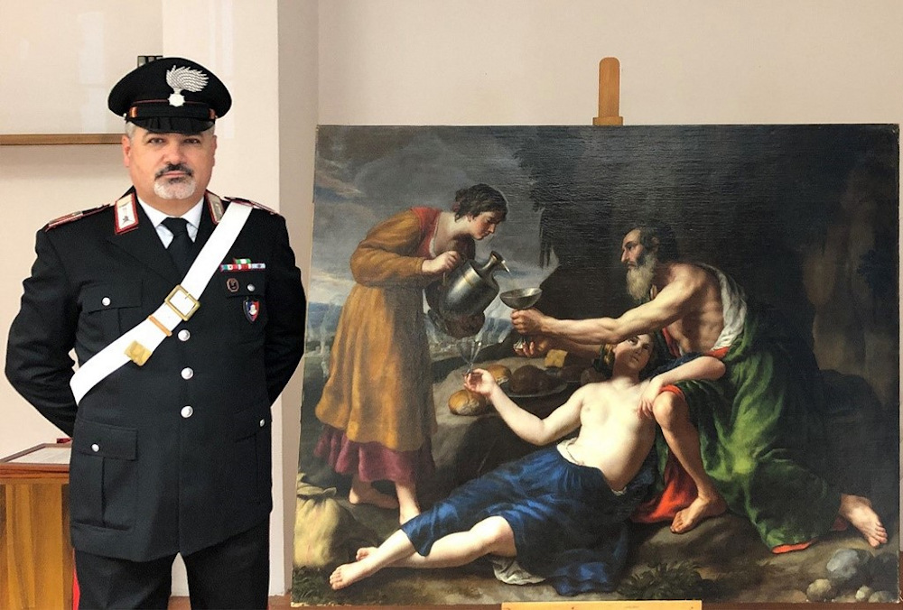 This photo released on April 1 2021, by the Carabinieri Press Office show the seventeenth-century oil painting on canvas u00e2u20acu02dcLoth avec ses deux filles lui servant boireu00e2u20acu2122 attributed to the French artist Nicolas Poussin. u00e2u20acu201d AFP pic
