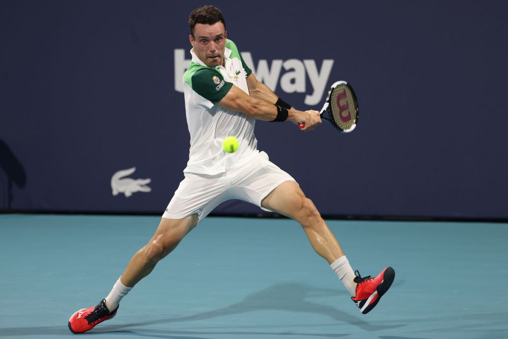 Roberto Bautista Agut of Spain hits a backhand against Daniil Medvedev of Russia in a men's singles quarterfinal in the Miami Open at Hard Rock Stadium, Miami March 30, 2021. u00e2u20acu201d Reuters pic 
