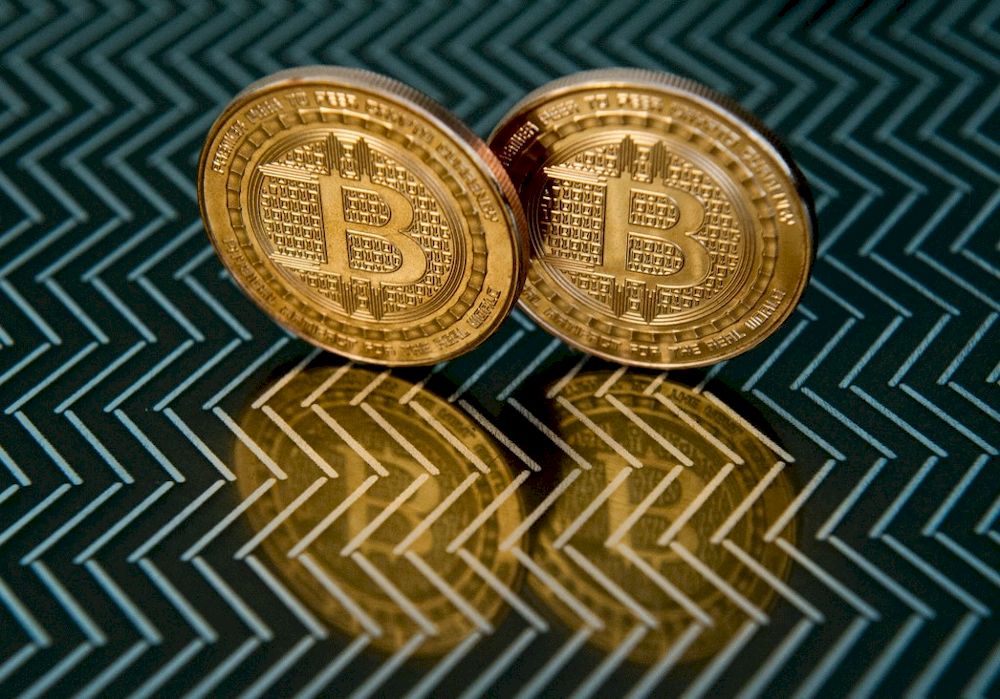 In this file photo taken on June 17, 2014 in Washington, DC bitcoin medals are pictured. u00e2u20acu201d AFP pic