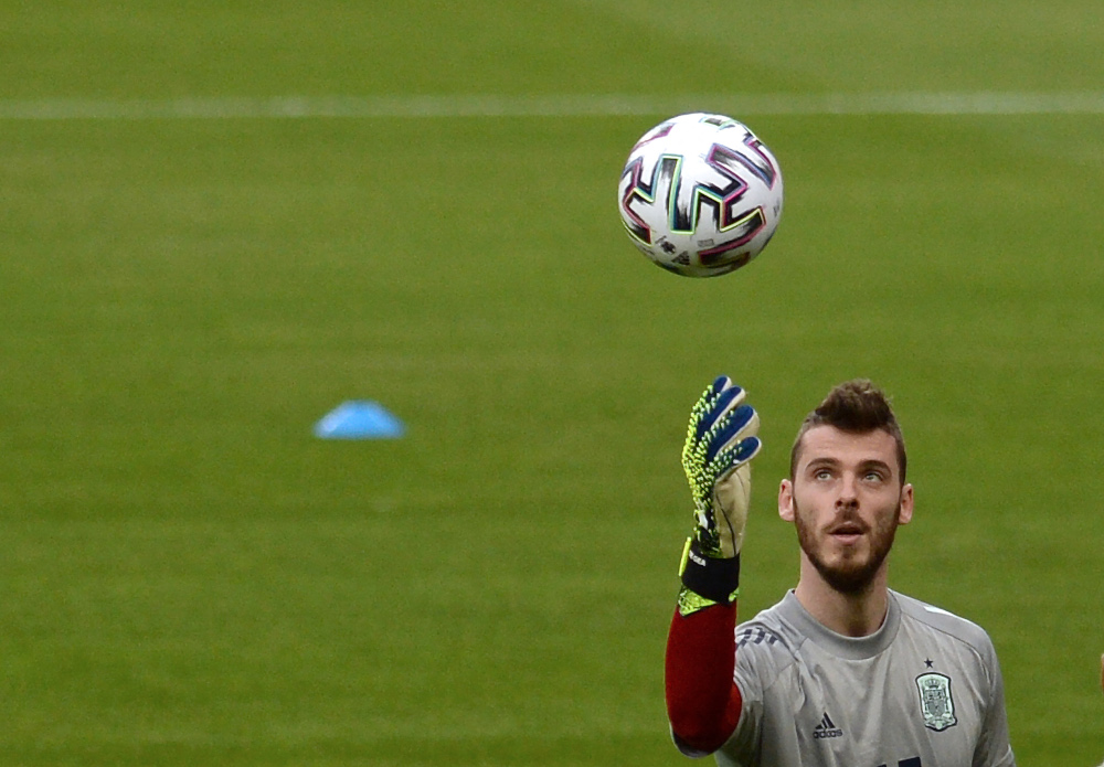 Spainu00e2u20acu2122s goalkeeper David De Gea plays with a ball during a training session at La Cartuja stadium in Seville March 31, 2021 on the eve of the Fifa World Cup Qatar 2022 qualification football match between Spain and Kosovo. u00e2u20acu201d AFP pic 