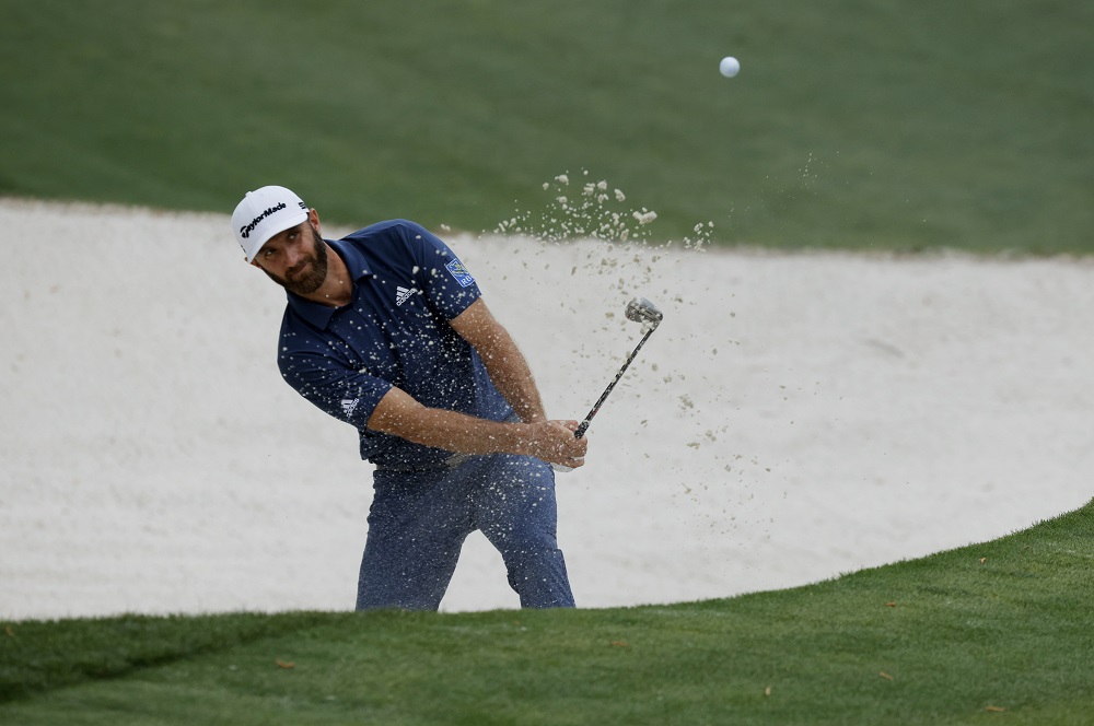 Dustin Johnson of the US plays out from the bunker onto the 10th green during the second round of the Augusta Masters April 9, 2021. u00e2u20acu2022 Reuters pic