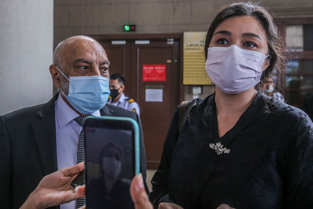 Lawyer Datuk Gurdial Singh Nijar (left) and Family Frontiers president Suriani Kempe at the Kuala Lumpur High Court Complex April 27, 2020. — Picture by Hari Anggara