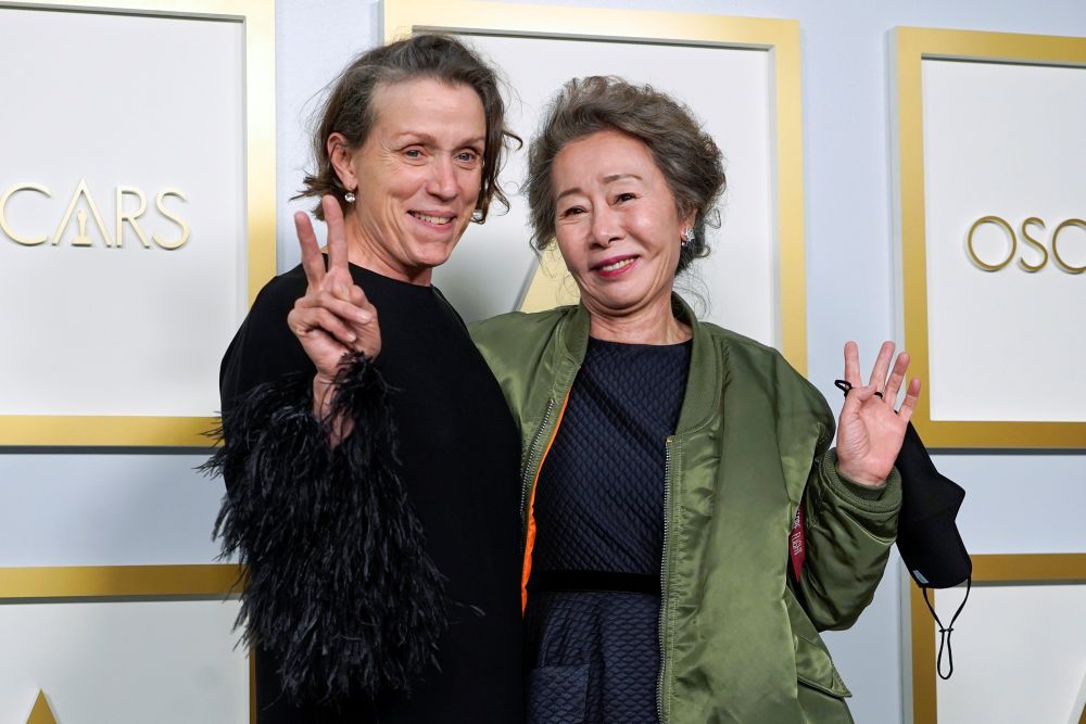 Frances McDormand (left) and Youn Yuh-Jung pose in the press room at the Oscars, in Los Angeles April 25, 2021. u00e2u20acu201d Reuters pic