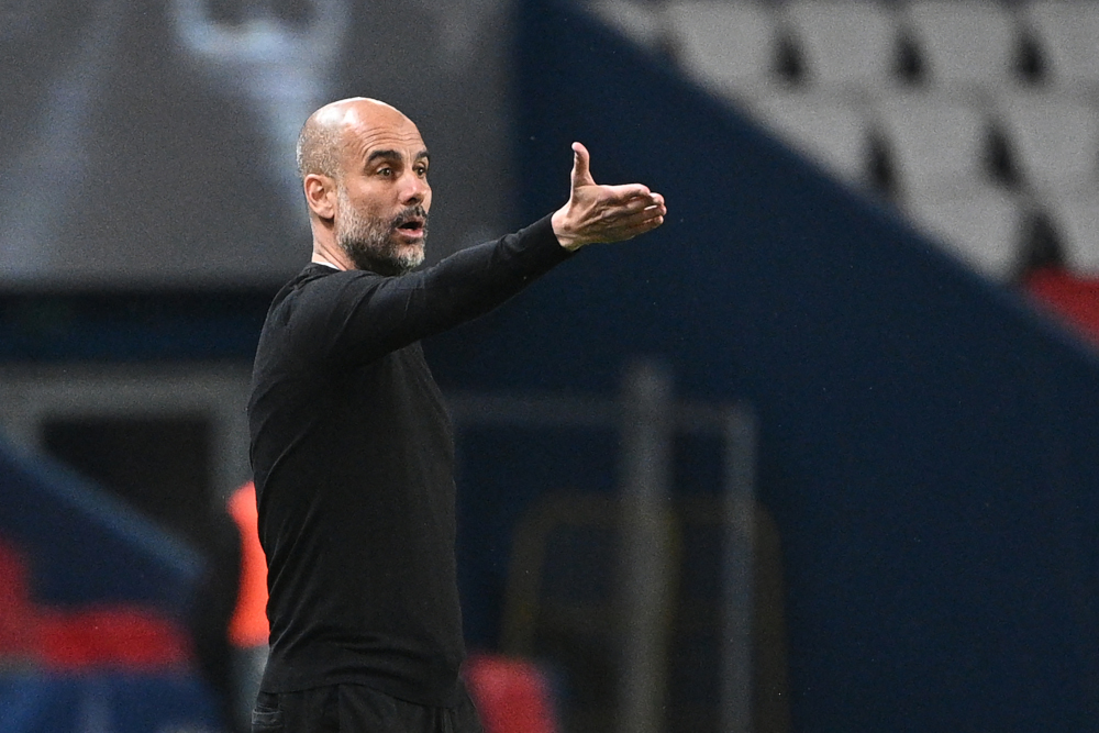Manchester City manager Pep Guardiola gives his instructions during the Uefa Champions League first leg semi-final football match between Paris Saint-Germain (PSG) and Manchester City at the Parc des Princes stadium in Paris April 28, 2021. u00e2u20acu201d AFP pic 