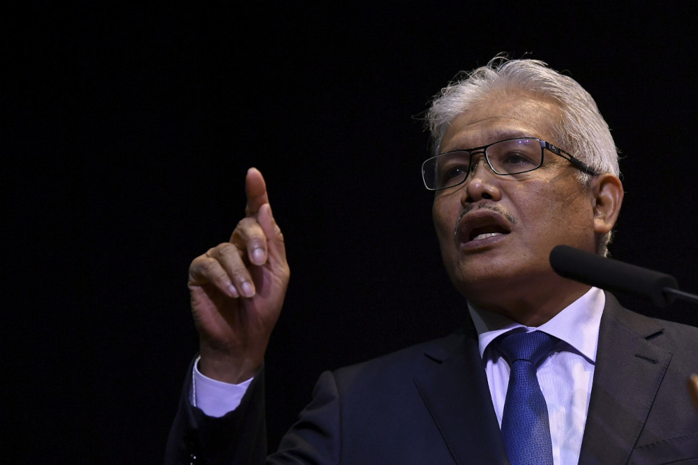 Home Minister Datuk Seri Hamzah Zainudin addressing the 2020 Outstanding Service Awards ceremony for the Immigration Department in Putrajaya, April 19, 2021. u00e2u20acu201d Bernama pic 