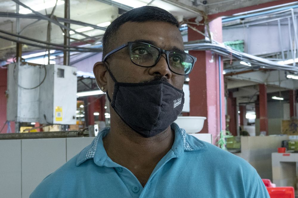Chicken trader Raja Ratnam speaks to Malay Mail during a survey at the Jalan Othman wet market in Petaling Jaya April 20, 2021. — Picture by Miera Zulyana