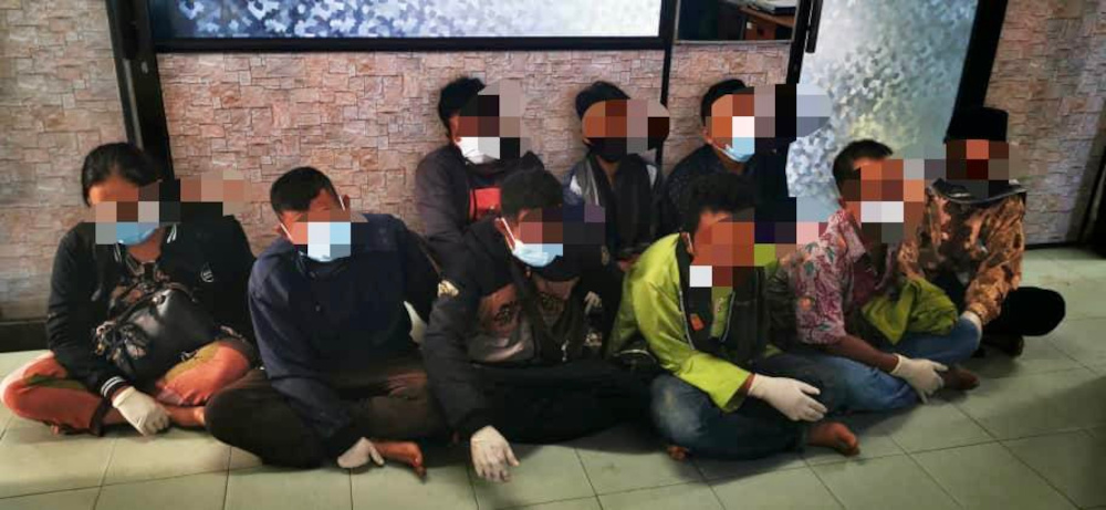 The undocumented Indonesian migrants who were arrested by police in Pantai Sungai Kuali in Permas, Pontian, April 6, 2021. u00e2u20acu201d Picture courtesy of the Region Two Marine Police Forcenn