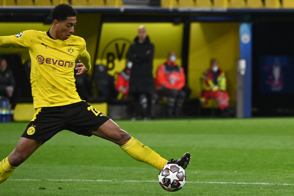 Dortmundu00e2u20acu2122s English midfielder Jude Bellingham receives the ball before scoring the opening goal during the Uefa Champions League quarter-final second leg football match against Manchester City in Dortmund, western Germany, April 14, 2021. u00e2u20acu201d AFP pic 