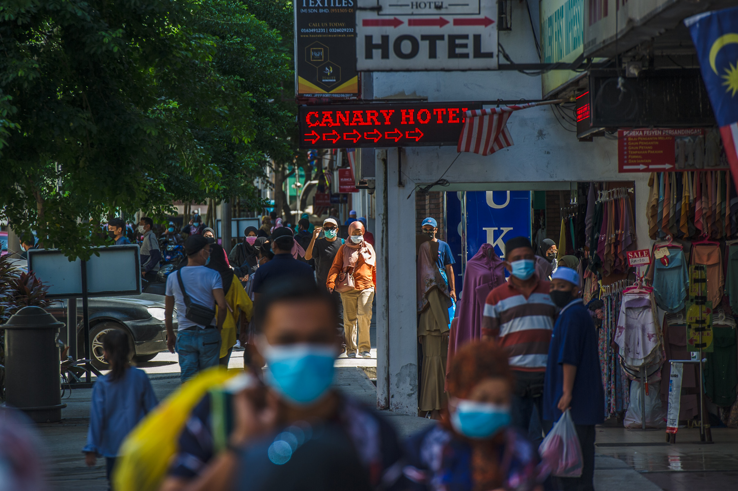 People wearing masks throng Jalan Tuanku Abdul Rahman to do some shopping in Kuala Lumpur April 18, 2021. u00e2u20acu201d Picture by Shafwan Zaidon