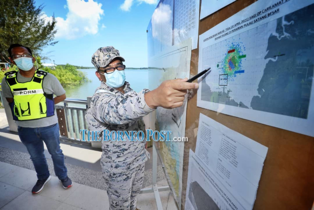 File photo showing Yousry pointing to the area of Chongu00e2u20acu2122s last dive on a map during the press conference. u00e2u20acu201d Photo by Chimon Upon