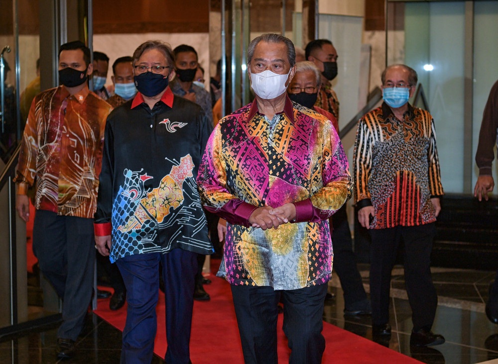 Prime Minister Tan Sri Muhyiddin Yassin with Sarawak Chief Minister Datuk Patinggi Abang Johari Tun Openg (2nd left) at Sarawak State Dinner during his two-day working visit to Sarawak, April 1, 2021. u00e2u20acu201d Bernama pic  