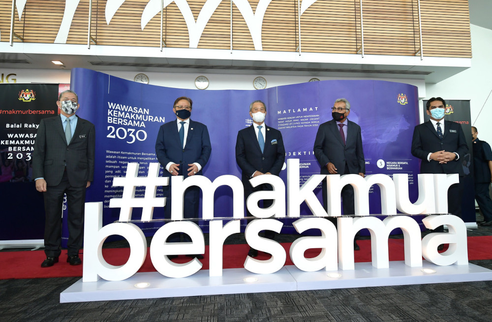 Prime Minister Tan Sri Muhyiddin Yassin poses for a photo while attending the 2030 Shared Prosperity Vision Town Hall at the Borneo Kuching Convention Centre (BCCK) in Kuching, April 1, 2021. u00e2u20acu201d Bernama pic  