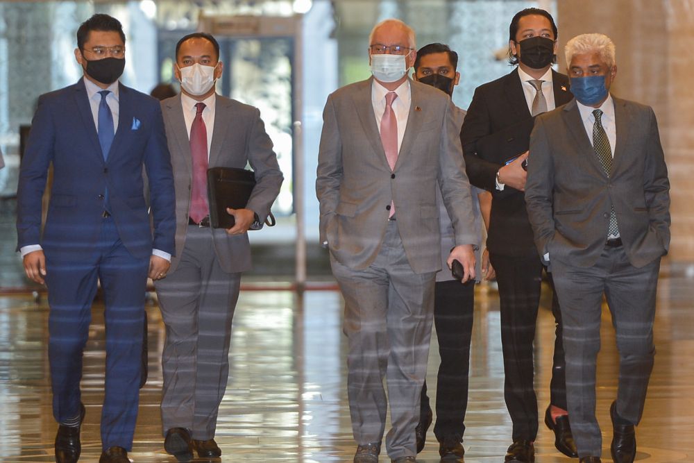 Datuk Seri Najib Razak arrives at the Court of Appeal in Putrajaya April 14, 2021. u00e2u20acu201d Picture by Miera Zulyana