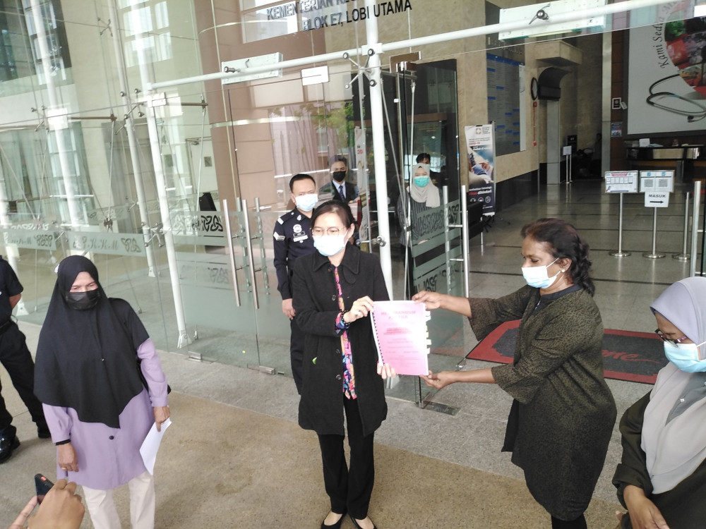 The National Union of Workers in Hospital Support and Allied Services handing the memorandum to the Health Ministry in Putrajaya, April 8, 2021. u00e2u20acu201d Picture from Twitter/Bila Kami Bersatu