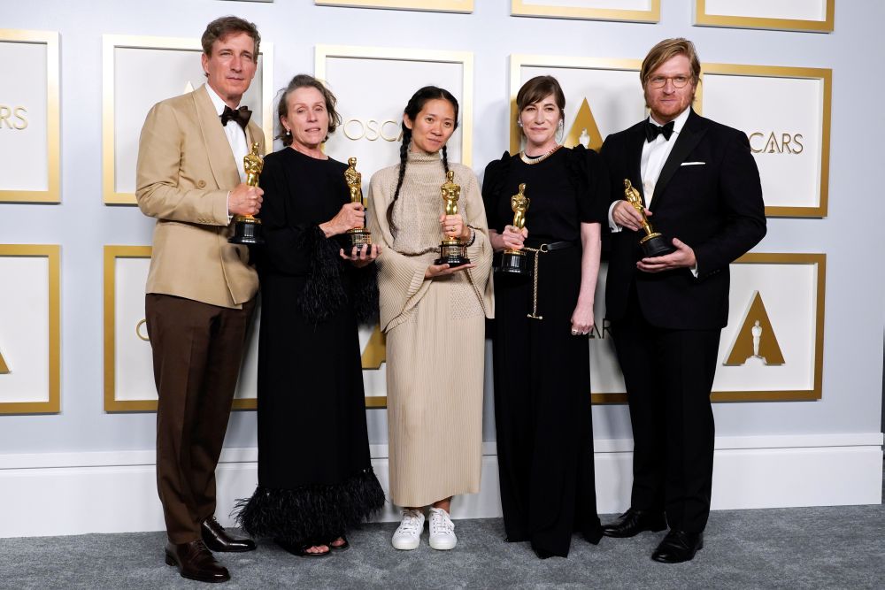 nProducers Peter Spears, Frances McDormand, Chloe Zhao, Mollye Asher and Dan Janvey, winners of the award for best picture for u00e2u20acu02dcNomadlandu00e2u20acu2122, pose in the press room at the Oscars, in Los Angeles April 25, 2021. u00e2u20acu201d Reuters picn