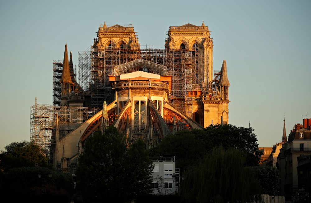 nThe Paris' Cathedral Notre Dame at the sunrise on the eve of the first anniversary of the violent fire who destroyed a large part of the monument. u00e2u20acu201d AFP picnn