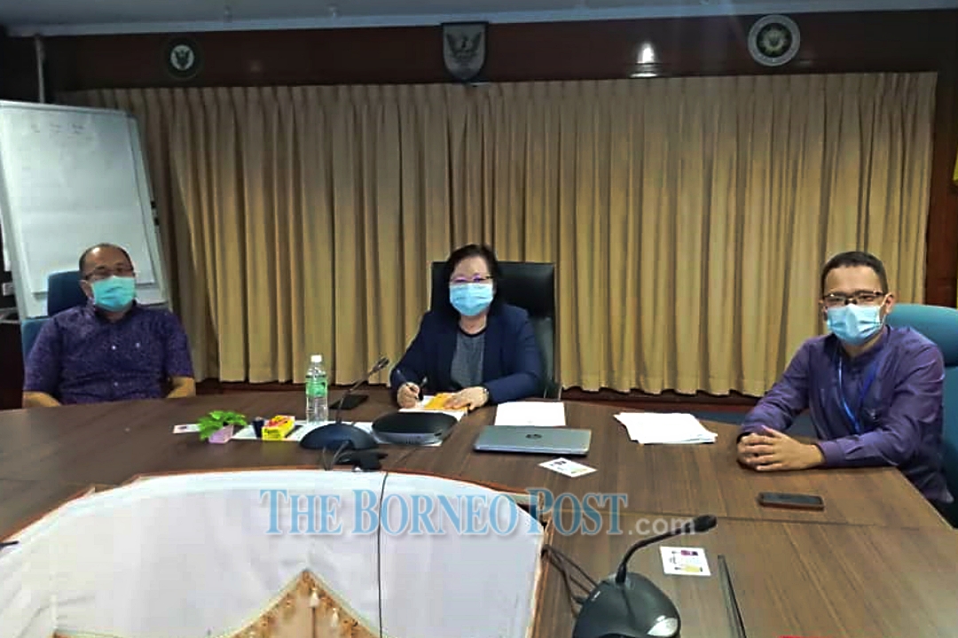 Felicia Tan (centre) flanked by Christopher (left) and Dr Ling at the press conference. u00e2u20acu2022 Borneo Post pic