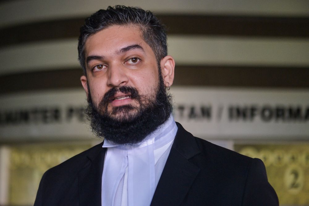 Lawyer V. Vemal Arasan speaks to reporters at the Shah Alam High Court April 21, 2021. u00e2u20acu201d Picture by Miera Zulyana