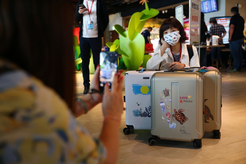 A traveller, wearing a face mask following the coronavirus disease outbreak, poses with luggage before the travel bubble flight to Palau, at Taoyuan International Airport in Taiwan April 1, 2021. u00e2u20acu201d Reuters pic 