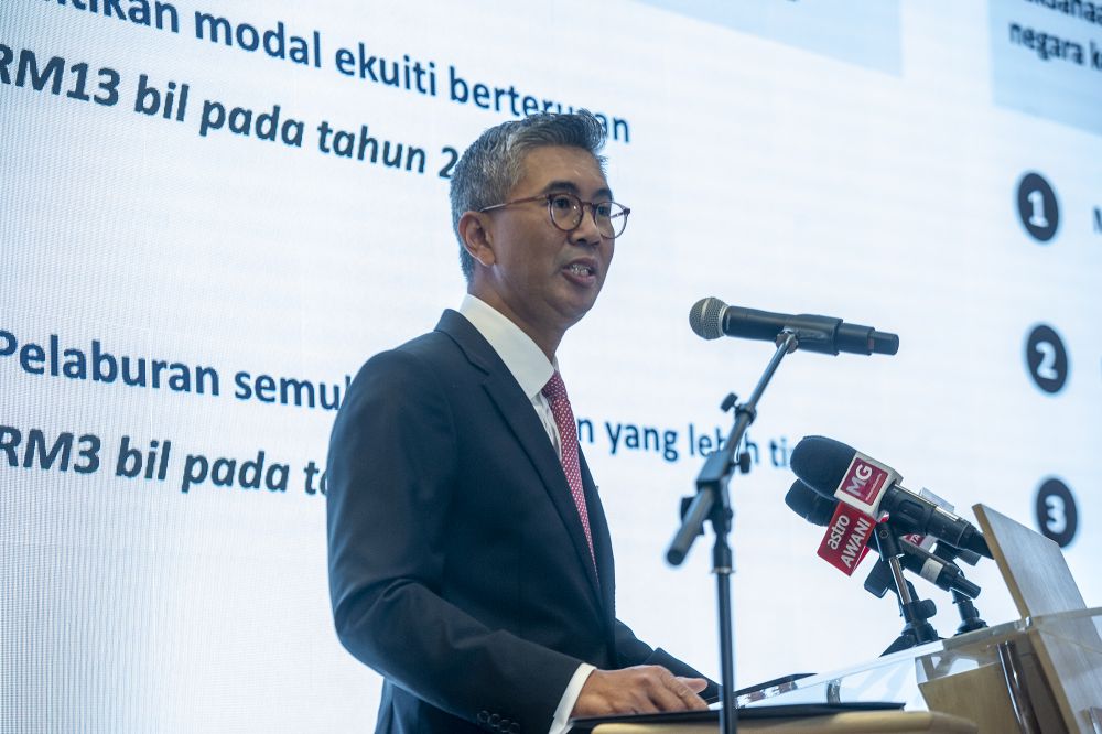Datuk Seri Tengku Zafrul Abdul Aziz delivers his speech during a special press conference at the Finance Ministry, Putrajaya April 26, 2021. u00e2u20acu201d Picture by Shafwan Zaidon 