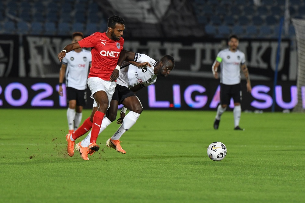 Terengganu FCu00e2u20acu2122s Makan Konate (second right) in action with PJ City FC player Prabakaran Kanadasan during the Super League match in Gong Badak April 2, 2021. u00e2u20acu2022 Bernama pic