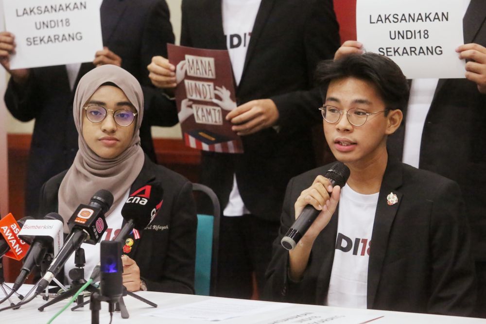 Two of the 18 youths who filed the lawsuit, Nurul Rifayah (left) and Rifqi Faisal (right) both aged 18. — Picture by Choo Choy May
