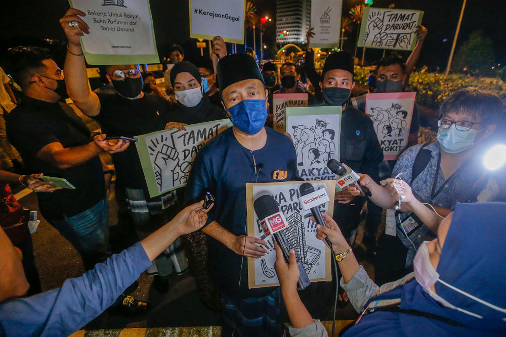Pejuang president Datuk Seri Mukhriz Mahathir speaks to reporters in front of the Parliament building, April 30, 2021. u00e2u20acu2022 Picture by Hari Anggara