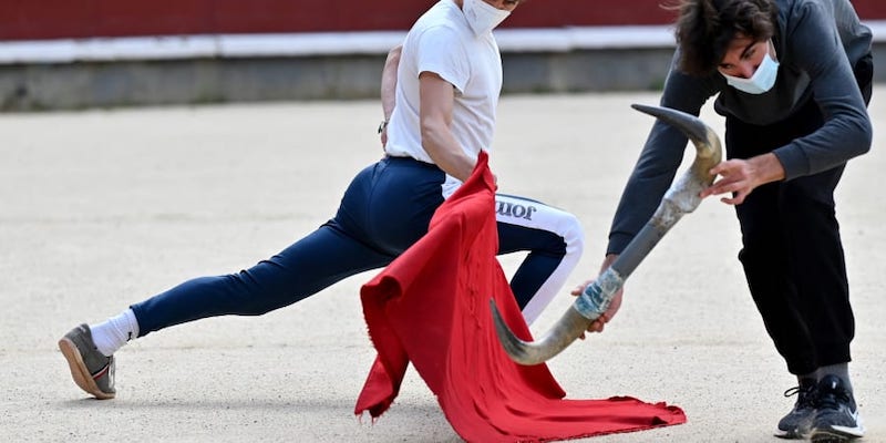 Alvaro Burdiel, 22, pupil at the Bullfighting School practises in Las Ventas bullring. u00e2u20acu201d AFP pic