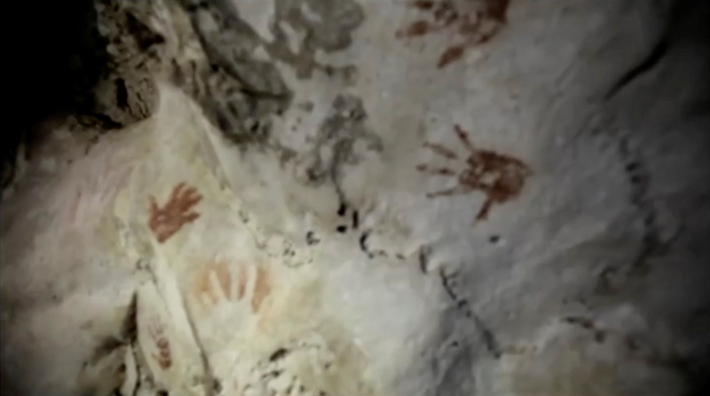 Hand prints, reportedly 1,200 years old, are seen on the cave walls, in Merida, Mexico April 2021, in this screengrab taken from a handout video. u00e2u20acu201d Sergio Grosjean handout via Reuters