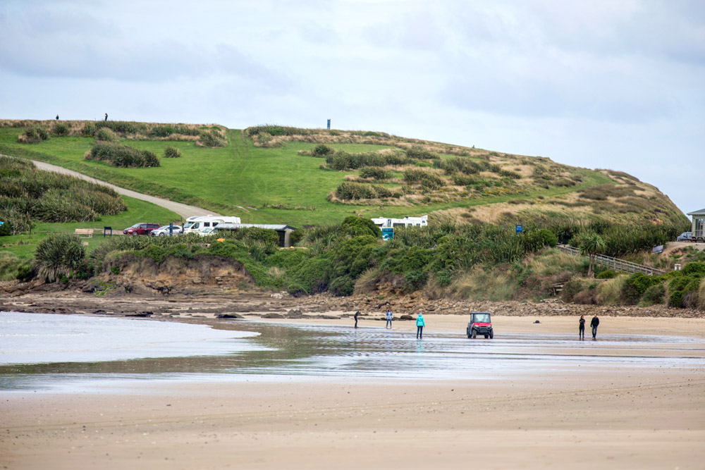 The idyllic sandy beach of Porpoise Bay.