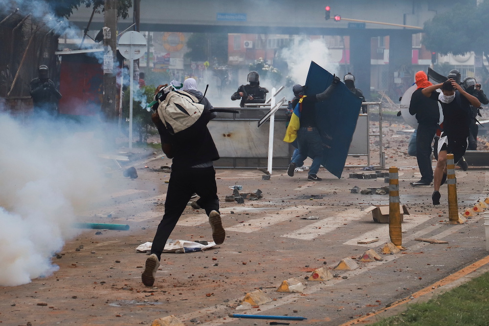 Demonstrators clash with members of the security forces during a protest against what they say was police brutality exerted in recent protests against President Ivan Duque's government's tax reform in Cali, Colombia May 3, 2021. u00e2u20acu201d Reuters pic