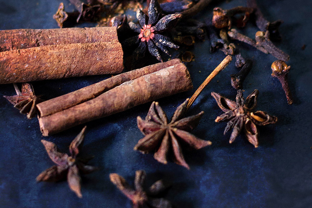 Dried spices such as cinnamon and cloves can add depth to your fruit and flower tea.