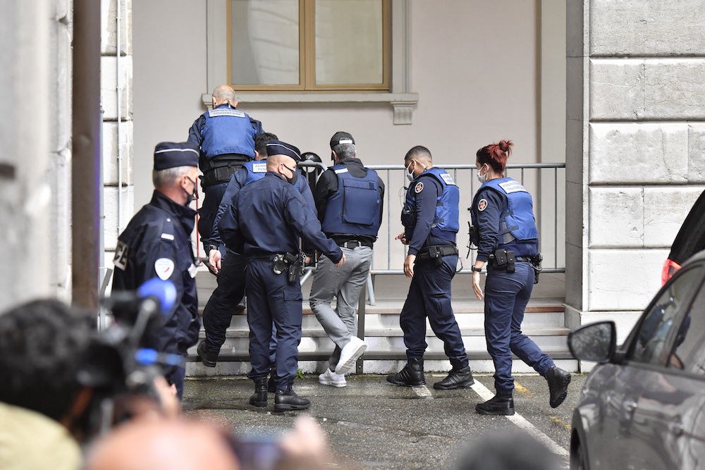 Nordahl Lelandais, is escorted by French prison administration officers as he arrives at the courthouse of the French Alps city of Chambery on May 7, 2021. u00e2u20acu201d AFP pic