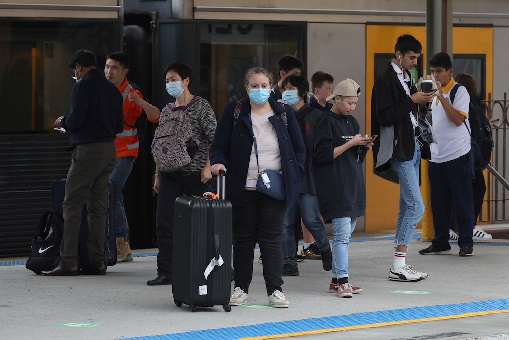 People, some wearing protective face masks, stand on a train platform at Central Station in Sydney, Australia May 6, 2021. u00e2u20acu201d Reuters pic
