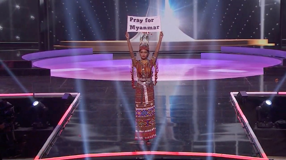 Ma Thuzar Wint Lwin, Miss Universe Myanmar, holds up the u00e2u20acu02dcPray for Myanmaru00e2u20acu2122 sign during Miss Universe pageant's national costume show, in Hollywood, Florida May 13, 2021 in this screengrab taken from a handout video. u00e2u20acu201d Miss Universe handout via Reut