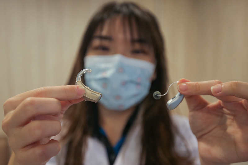 Audiologist Sylvia Lee got her suppliers to sponsor 28 hearing aids for children from poor families. — Picture by Farhan Najib