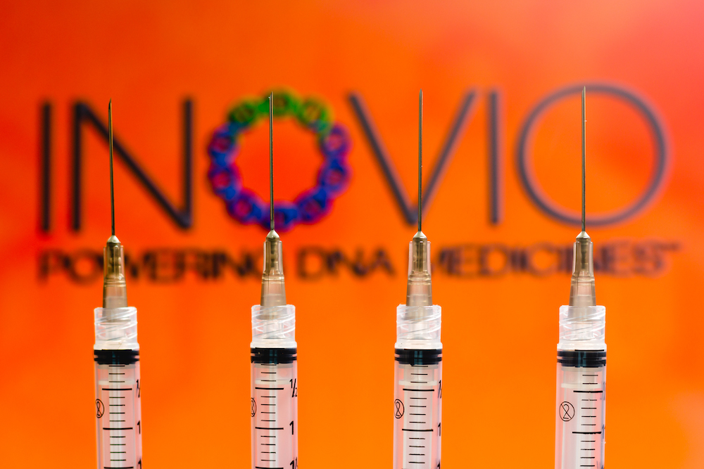 In this photo illustration various medical syringes seen with Inovio Pharmaceuticals company logo displayed on a screen in the background. u00e2u20acu201d Photo by Sopa via Reuters