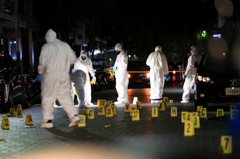 Maldivian police officers inspect the area after a blast outside the family home of the speaker of parliament, former President Mohamed Nasheed, in Male, Maldives May 6, 2021. u00e2u20acu201d Picture courtesy of Maldives Police Service/Handout via Reuters pic