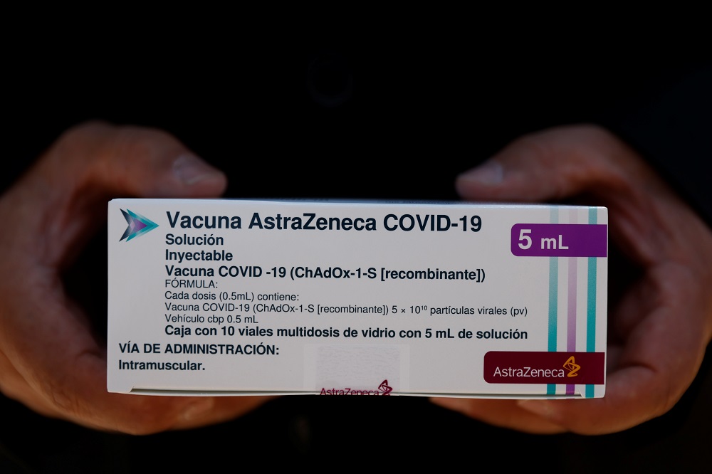 A man holds an empty box of AstraZenecau00e2u20acu2122s Covid-19 vaccine, outside the Liomont labouratory company where they are bottling the vaccine, during a news conference in Ocoyoacac, State of Mexico May 19, 2021. u00e2u20acu201d Reuters pic