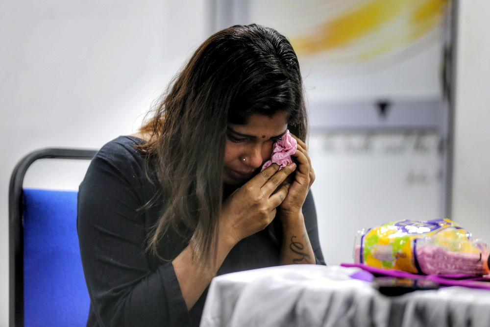 R. Laviniya was three months pregnant when her husband was arrested by the police. — Picture by Ahmad Zamzahuri