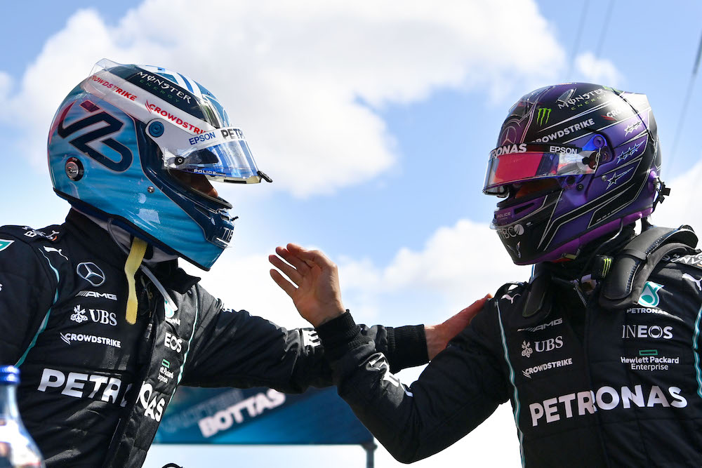 Mercedes' British driver Lewis Hamilton congratulates Mercedes' Finnish driver Valtteri Bottas after the qualifying session of the Portuguese Grand Prix on Algarve International Circuit, Portimao, Portugal May 1, 2021  u00e2u20acu201d Reuters pool pic