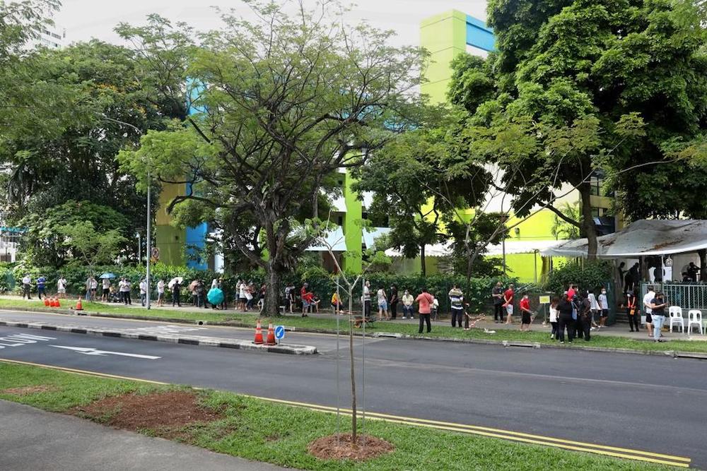 Queues seen outside the former Da Qiao Primary School at Ang Mo Kio, one of the regional screening centres for Covid-19 swab testing, on May 3, 2021. u00e2u20acu201d TODAY pic