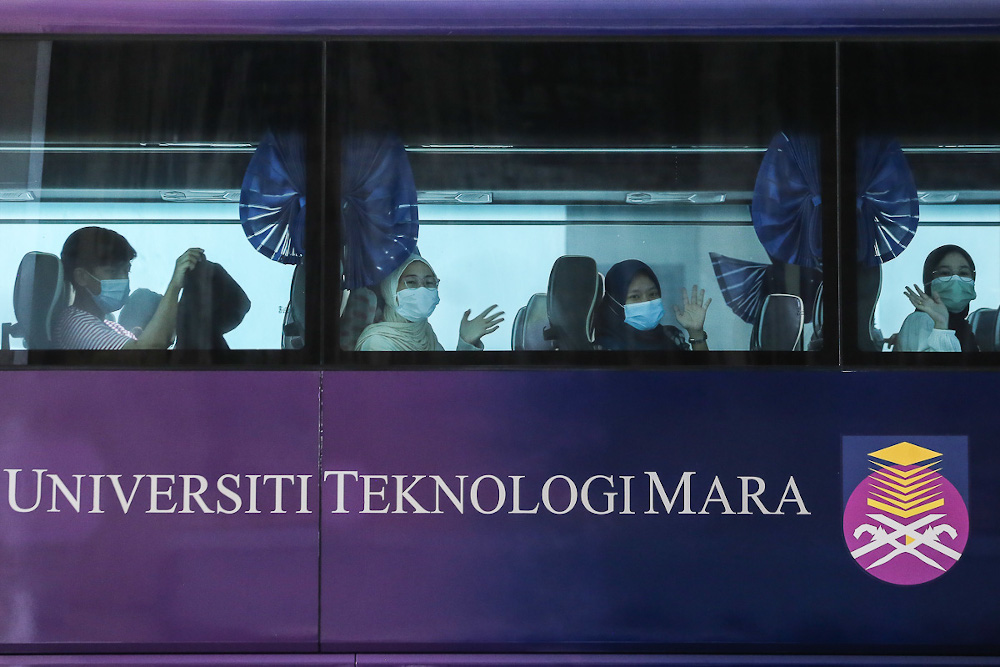 Students on board a bus at UiTM Shah Alam May 7, 2021. u00e2u20acu2022 Picture by Yusof Mat Isa