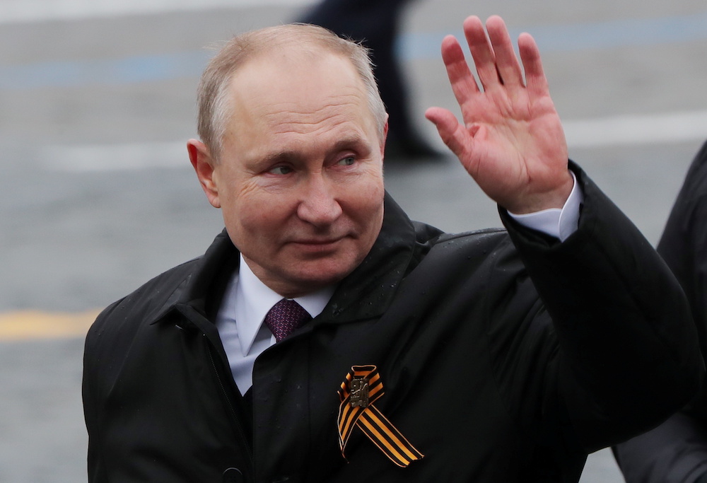 Russian President Vladimir Putin waves while walking along Red Square after a military parade on Victory Day, which marks the 76th anniversary of the victory over Nazi Germany in World War Two, in central Moscow, Russia May 9, 2021. u00e2u20acu201d Reuters pic 
