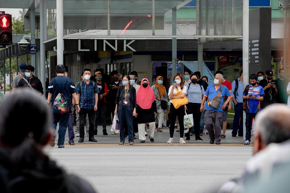 Pedestrians at a traffic light junction near JCube shopping mall in Jurong East on May 17, 2021. u00e2u20acu201d TODAY pic