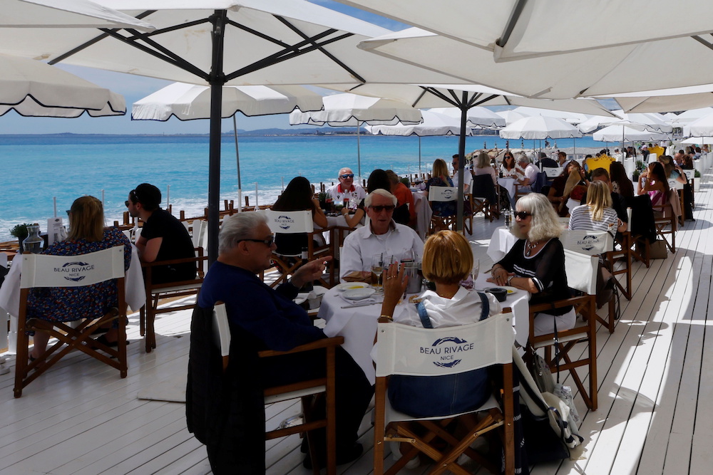 Customers enjoy a lunch on the terrace of a beach restaurant in Nice as cafes, bars and restaurants reopen after closing down for months amid the coronavirus disease (Covid-19) outbreak in France, May 19, 2021. u00e2u20acu201d Reuters pic 