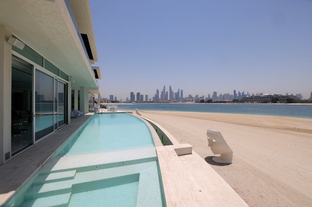This picture shows the swimming pool of a luxury villa for sale on one of the Palm Jumeirah man-made island, on the coast of the Gulf emirate of Dubai, on May 19, 2021. u00e2u20acu201d AFP pic